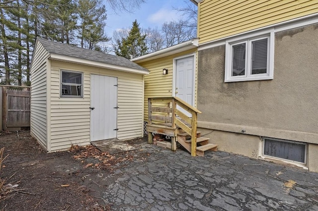 view of exterior entry featuring a patio