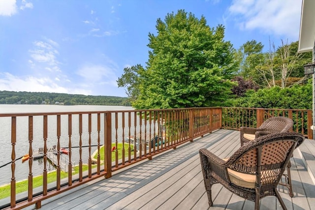 deck featuring a water view