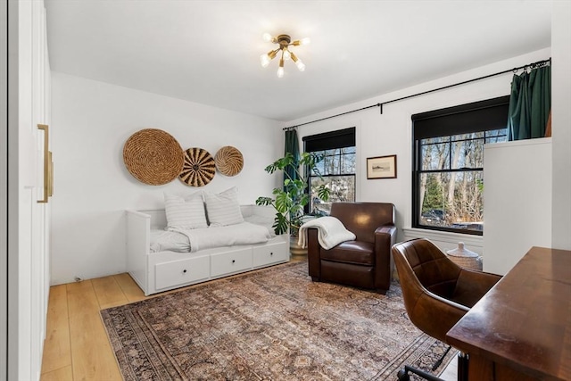 home office with light hardwood / wood-style floors