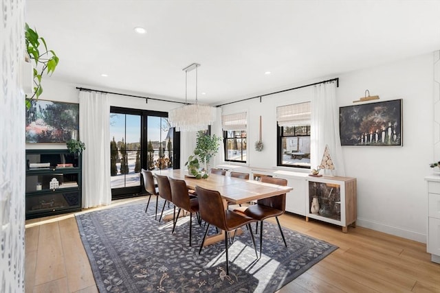 dining room with light wood-type flooring