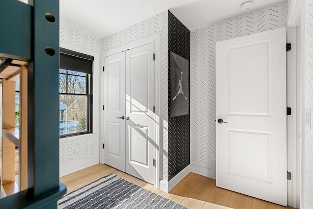 foyer entrance featuring wood-type flooring