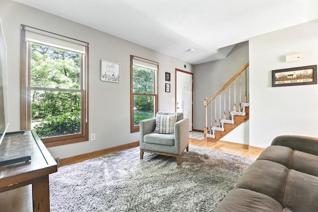 150 Hillside Rd Unit 2, Westfield, MA 01085 - living room featuring stairway, wood finished floors, and baseboards