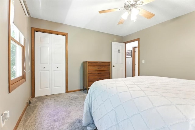 150 Hillside Rd Unit 2, Westfield, MA 01085 - bedroom featuring light carpet, baseboards, a closet, and a ceiling fan