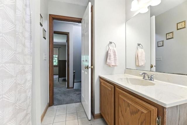 150 Hillside Rd Unit 2, Westfield, MA 01085 - bathroom with vanity, baseboards, and tile patterned flooring
