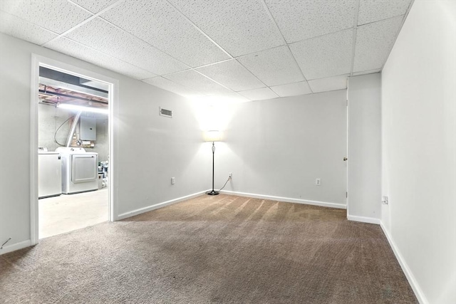 150 Hillside Rd Unit 2, Westfield, MA 01085 - carpeted empty room with washer and dryer, a paneled ceiling, baseboards, and electric panel