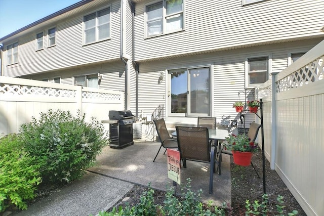 150 Hillside Rd Unit 2, Westfield, MA 01085 - fenced backyard featuring a patio area, grilling area, and outdoor dining area