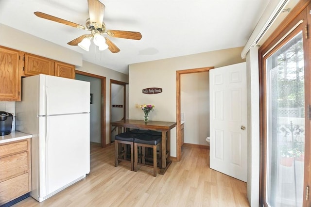 150 Hillside Rd Unit 2, Westfield, MA 01085 - kitchen featuring freestanding refrigerator, light wood-style floors, ceiling fan, and light countertops