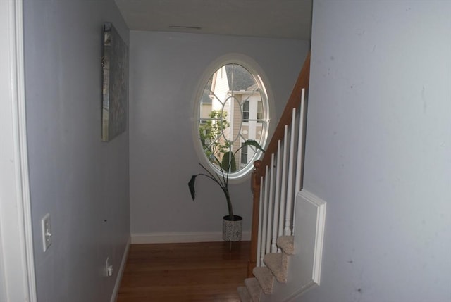 11 Rockingham Dr Unit 11, Tewksbury, MA 01876 - stairs featuring wood finished floors and baseboards