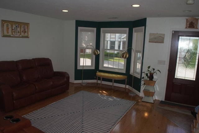 11 Rockingham Dr Unit 11, Tewksbury, MA 01876 - living area featuring healthy amount of natural light, wood finished floors, baseboards, and recessed lighting