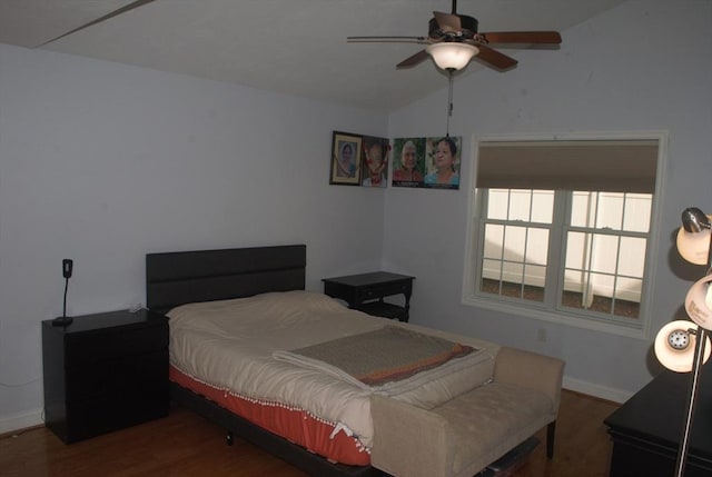 11 Rockingham Dr Unit 11, Tewksbury, MA 01876 - bedroom with wood finished floors, vaulted ceiling, baseboards, and a ceiling fan