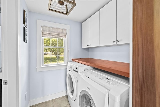 112 Hollett St, Scituate, MA 02066 - laundry area featuring cabinet space, washing machine and dryer, and baseboards