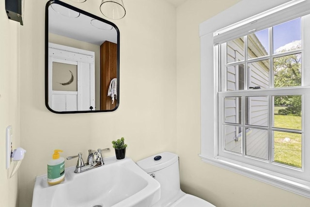 112 Hollett St, Scituate, MA 02066 - half bath with a sink, healthy amount of natural light, and toilet