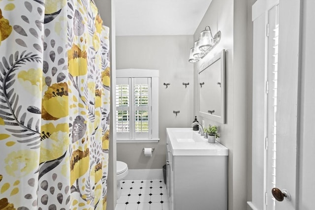 112 Hollett St, Scituate, MA 02066 - full bath with vanity, baseboards, toilet, and a shower with curtain