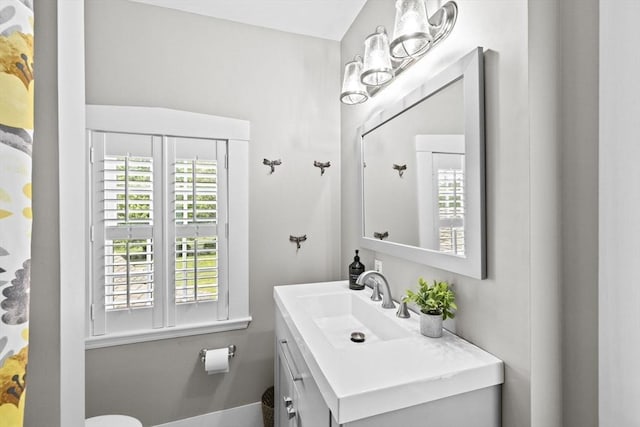 112 Hollett St, Scituate, MA 02066 - bathroom featuring vanity, toilet, and baseboards