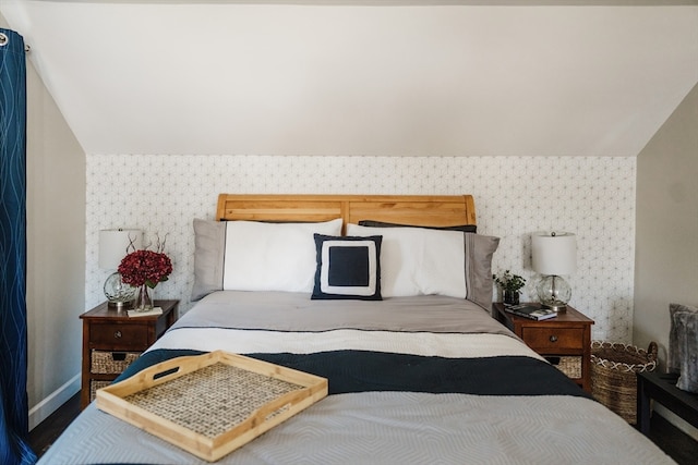 bedroom featuring vaulted ceiling