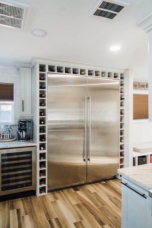 pantry with wine cooler