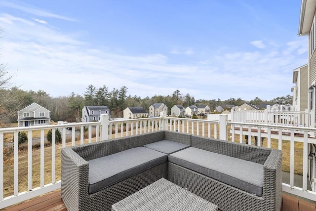 deck with a residential view and outdoor lounge area