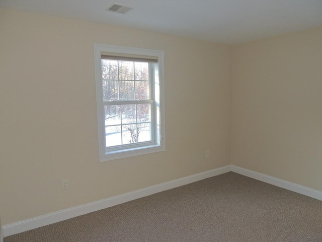 empty room featuring carpet