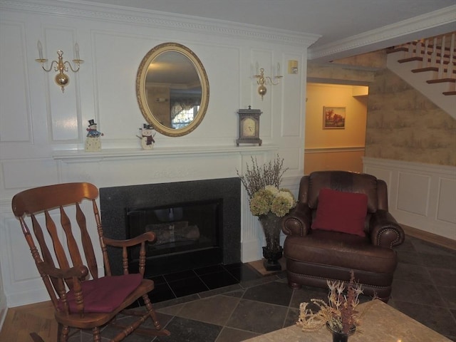 living area with crown molding