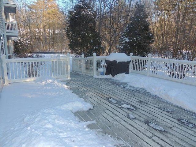 view of snow covered deck