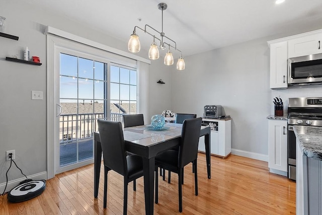 dining room featuring light wood-type flooring