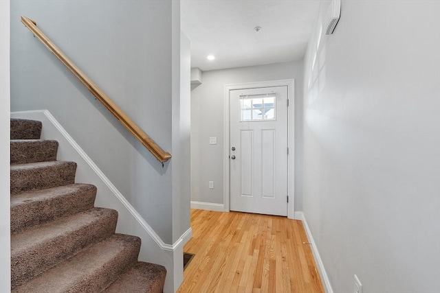 entrance foyer featuring wood-type flooring