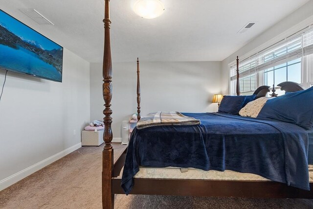 bedroom featuring carpet