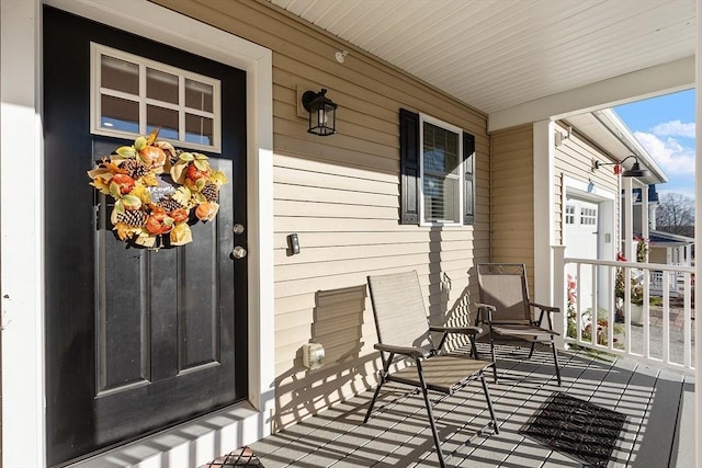 property entrance featuring covered porch