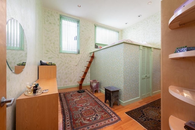 bathroom with wood-type flooring