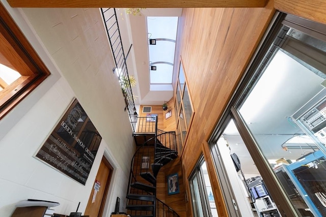 interior space featuring a towering ceiling