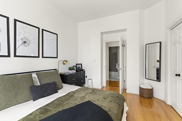416 Marlborough St Unit 504, Boston, MA 02115 - bedroom featuring baseboards and light wood-style floors