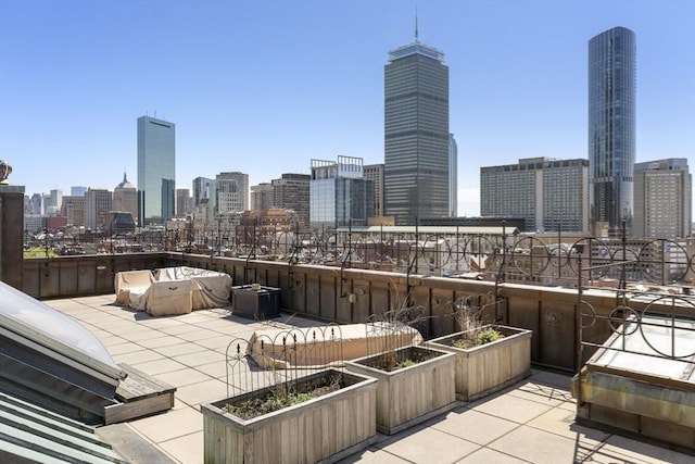 416 Marlborough St Unit 504, Boston, MA 02115 - view of patio featuring a city view