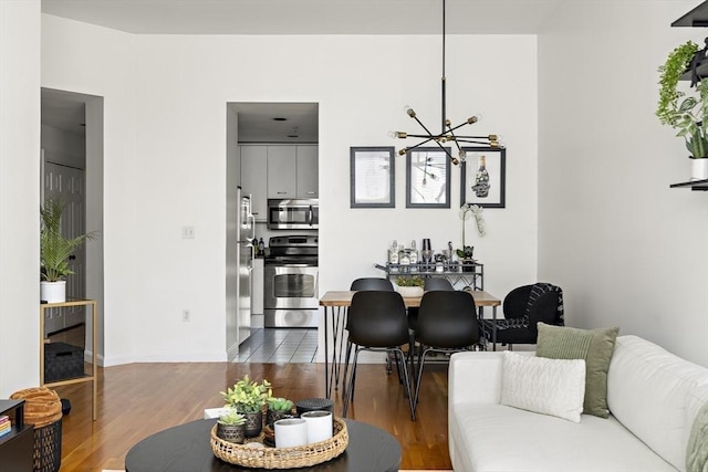 416 Marlborough St Unit 504, Boston, MA 02115 - living room with wood finished floors and a notable chandelier