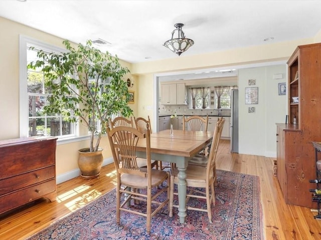151 Pilgrim Rd, Weymouth, MA 02191 - dining room featuring light wood-style floors and plenty of natural light