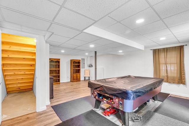 rec room featuring a drop ceiling, hardwood / wood-style floors, and billiards