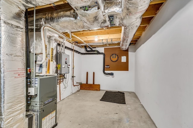 basement featuring water heater