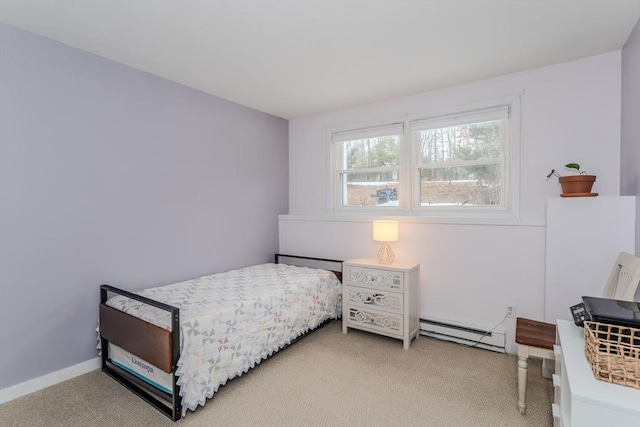 bedroom featuring a baseboard radiator, light colored carpet, and baseboards