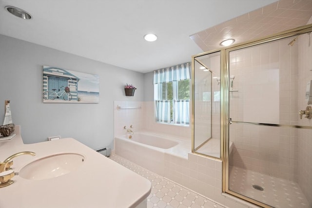 full bath with a sink, baseboard heating, a bath, a shower stall, and recessed lighting