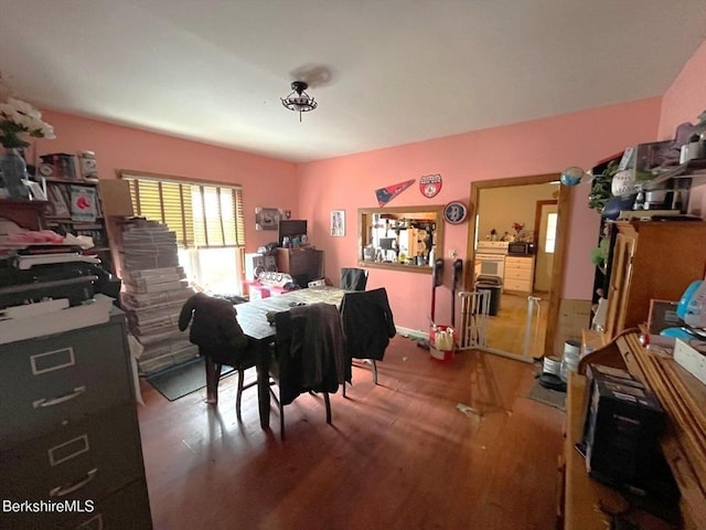 dining room with hardwood / wood-style floors