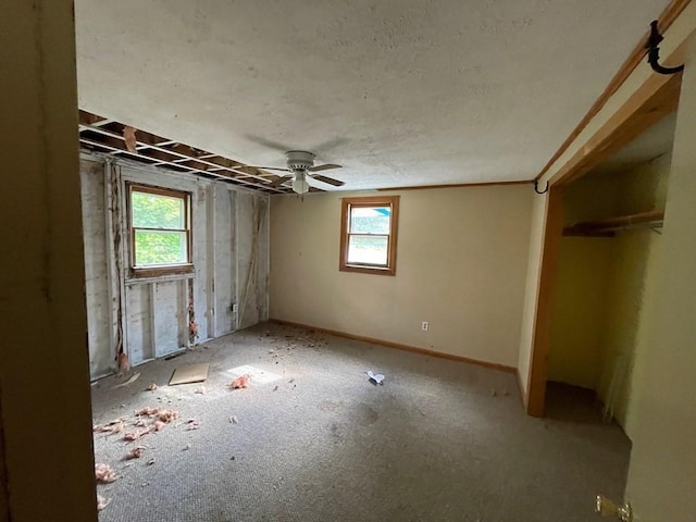 65 Beacon St, Melrose, MA 02176 - unfurnished bedroom with ceiling fan and a closet