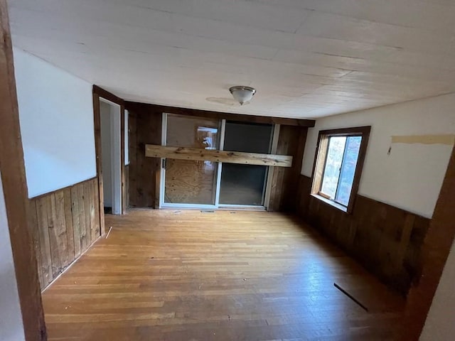 65 Beacon St, Melrose, MA 02176 - interior space with wooden walls and light hardwood / wood-style floors
