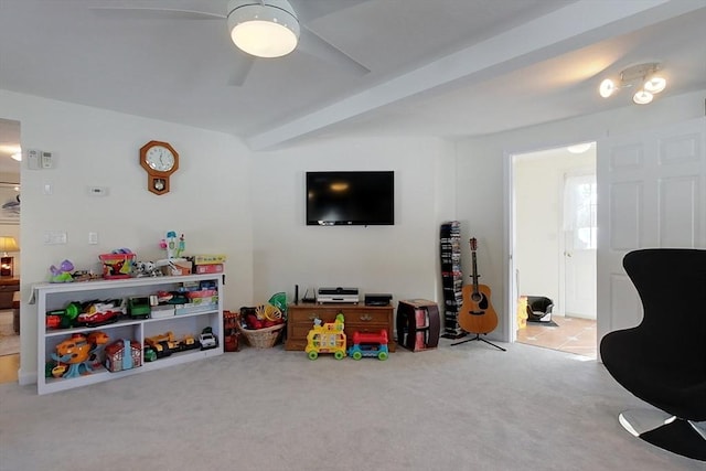 rec room with carpet floors and a ceiling fan