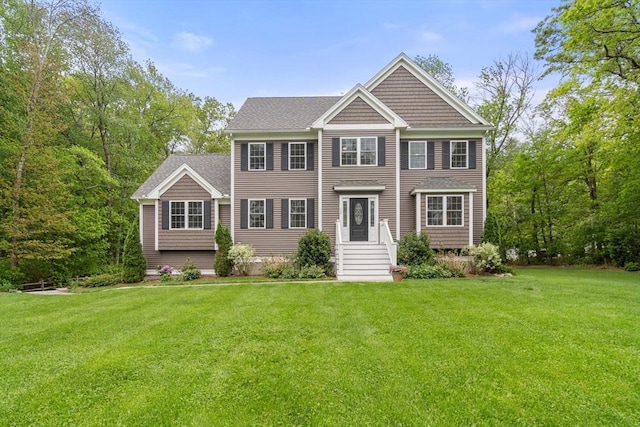 14R Boutwell St, Wilmington, MA 01887 - colonial house featuring a front lawn