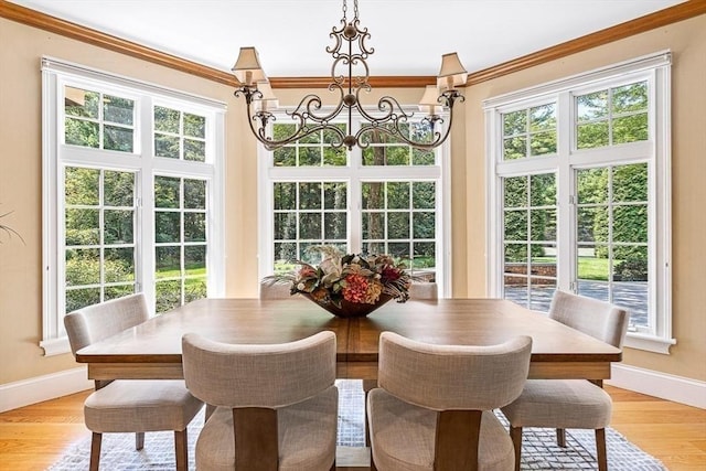 sunroom with an inviting chandelier