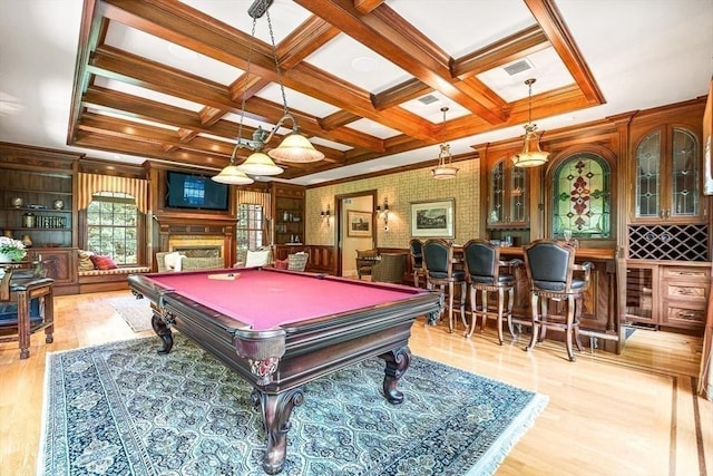 game room featuring visible vents, coffered ceiling, pool table, light wood-type flooring, and a fireplace