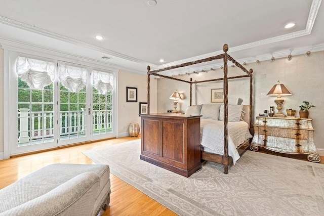 bedroom with recessed lighting, baseboards, access to outside, light wood-type flooring, and crown molding