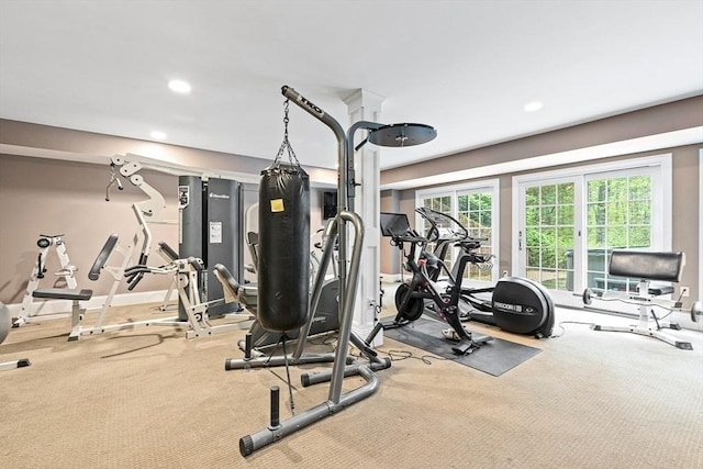 exercise room with carpet, baseboards, and recessed lighting