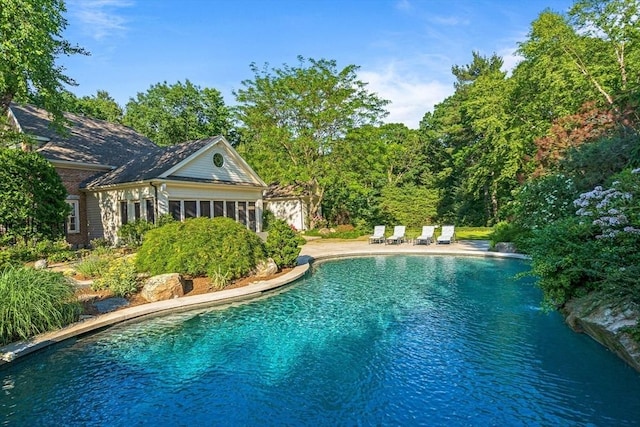 pool with a patio