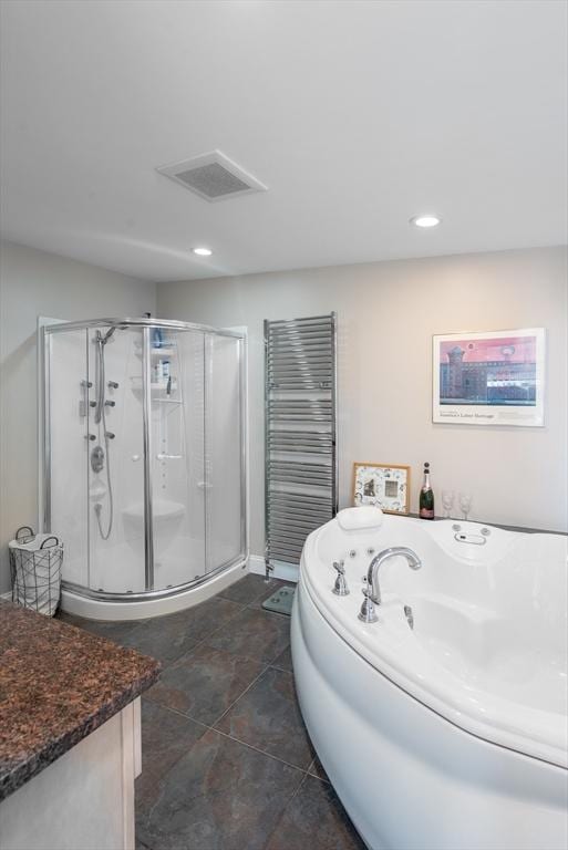 74 E Main St Unit 3, Gloucester, MA 01930 - bathroom featuring a shower stall, a whirlpool tub, a towel warmer, recessed lighting, and baseboards