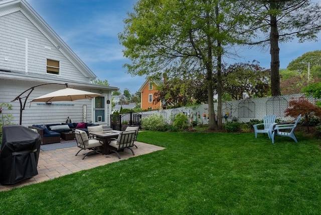 74 E Main St Unit 3, Gloucester, MA 01930 - view of yard with an outdoor living space and a patio
